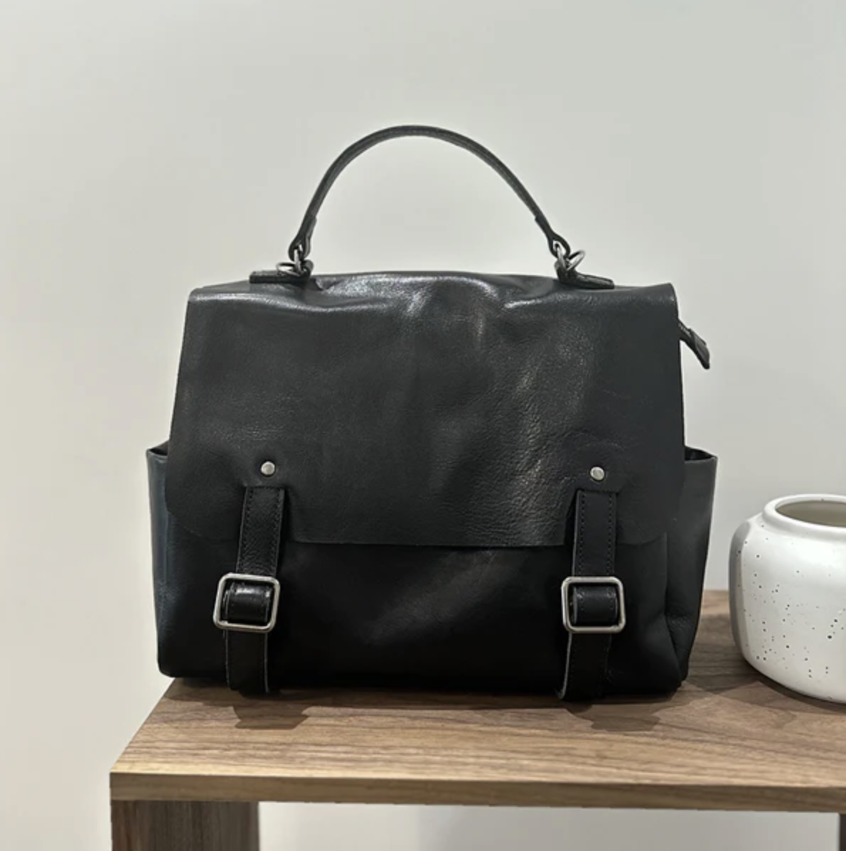 “full grain leather compact backpack everyday carry bag”